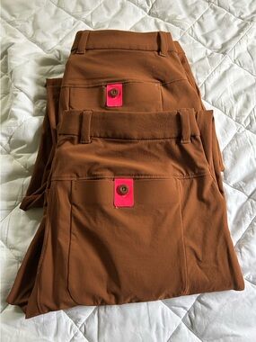 Rapha Rust Brown Trousers High vis. pink accents and reflective logo.